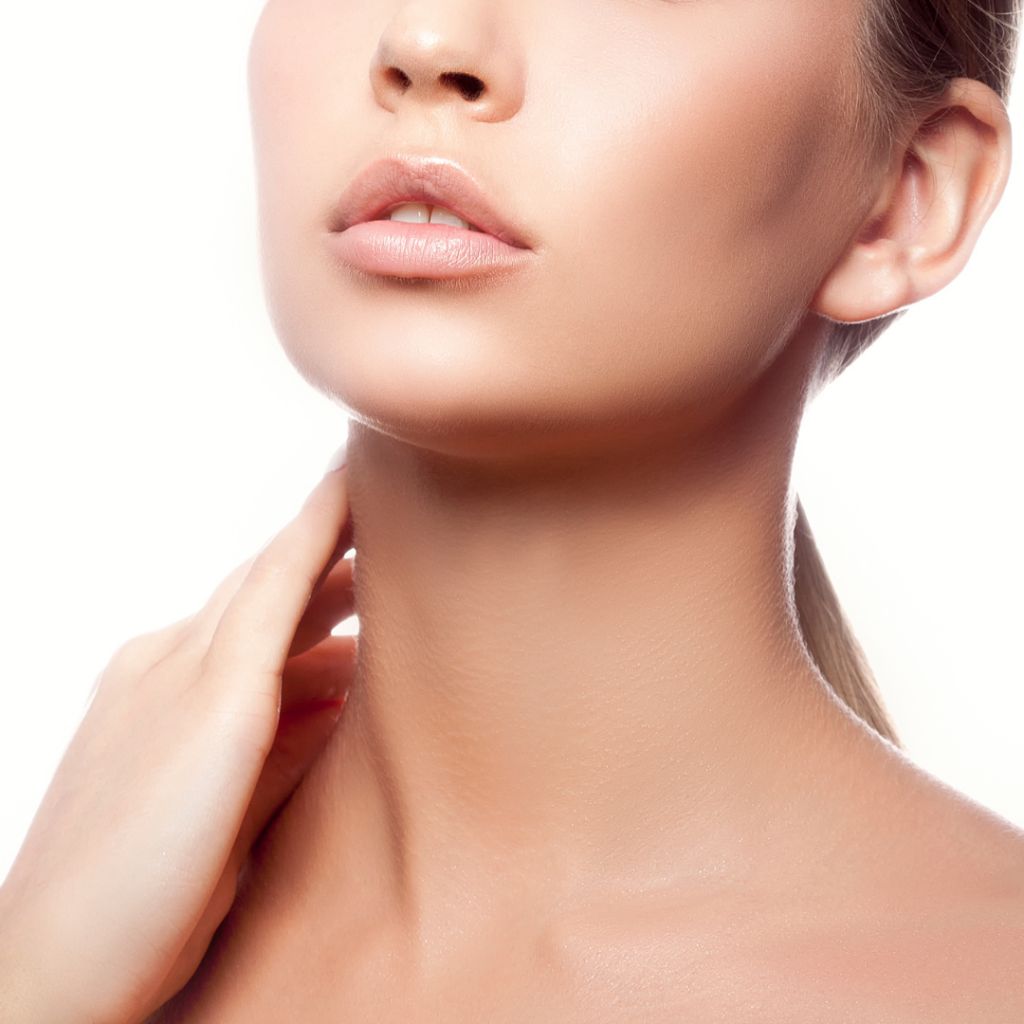 A close-up of a woman’s lips and lower face