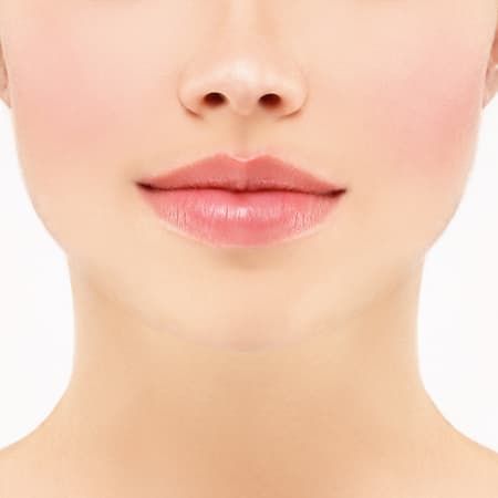 Close-up of a woman's lips and chin